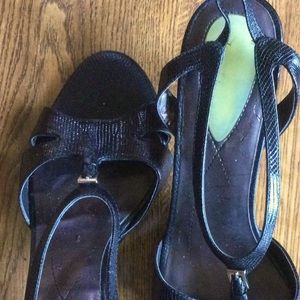 Black embossed leather sandals